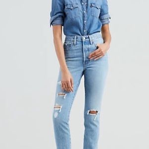 High rise Levi 501s ripped jeans